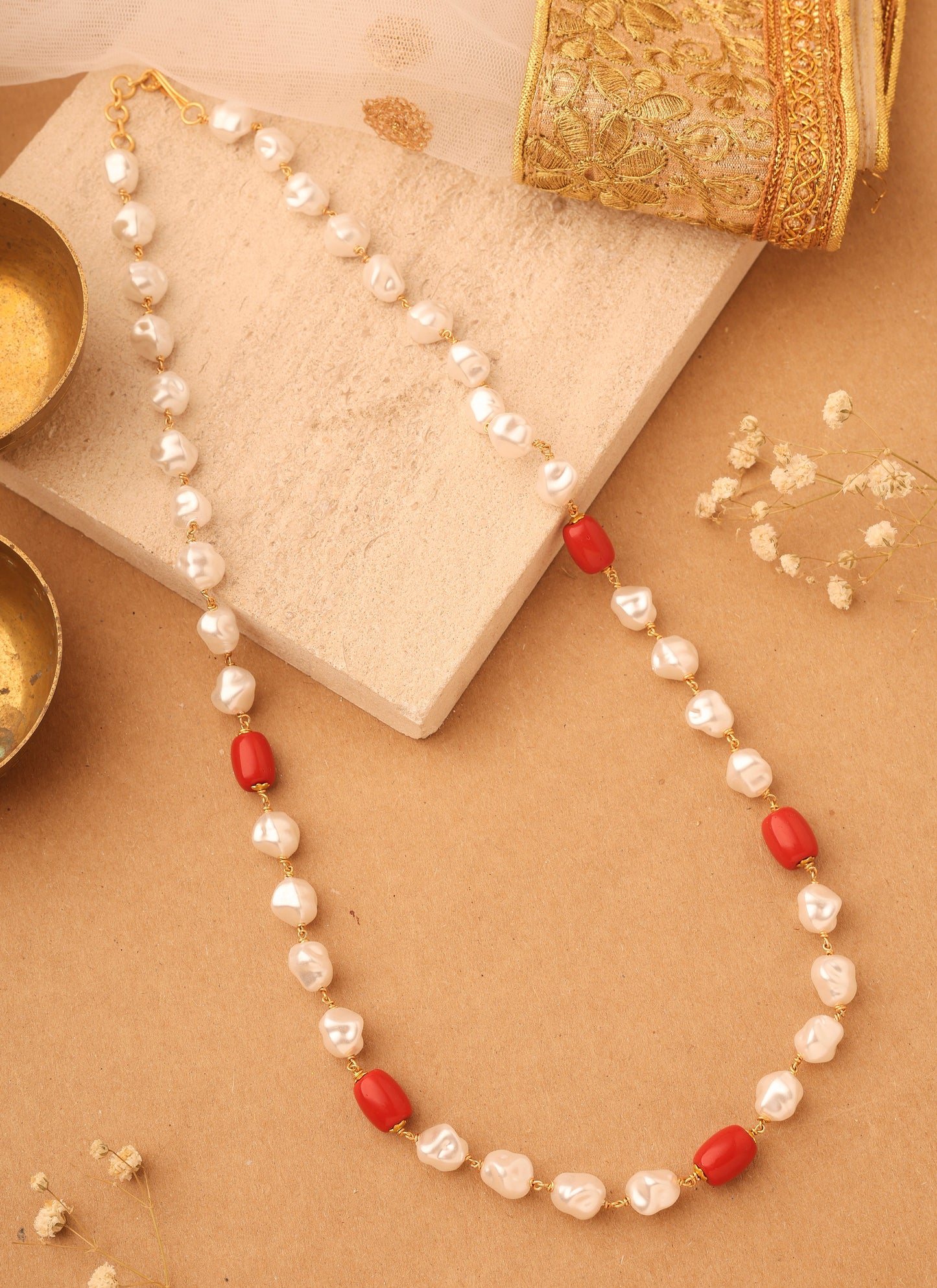 Natural Elegance: Necklace of Shapeless White Pearls with Orange-Red Accents