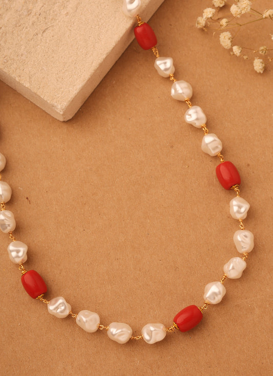 Natural Elegance: Necklace of Shapeless White Pearls with Orange-Red Accents