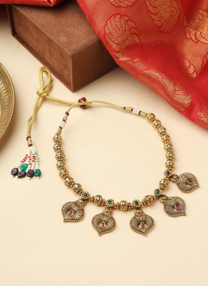 High Gold Necklace with Gold Motifs Matching Earrings and Stone Accents