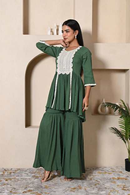 Green short kurta sharara set with heavy lace work for festival wear