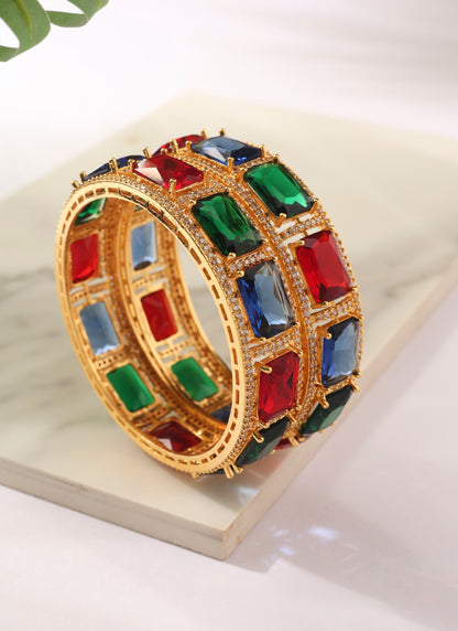 Set of two Gold Bangles with Green, Red and Blue Rubies