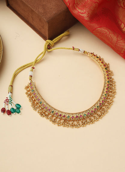 Traditional kundan choker set with gold beads