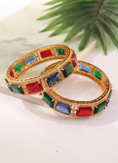 Set of two Gold Bangles with Green, Red and Blue Rubies