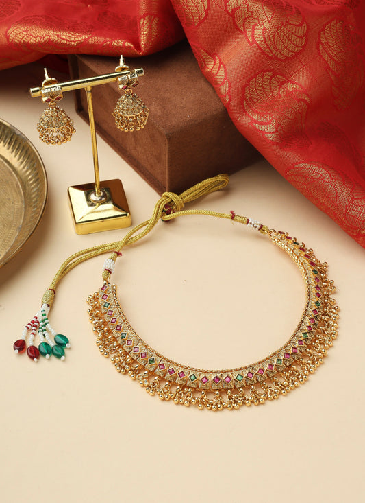 Traditional kundan choker set with gold beads